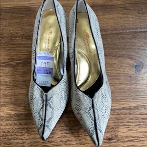 Snakeskin print heels. Size 7 1/2